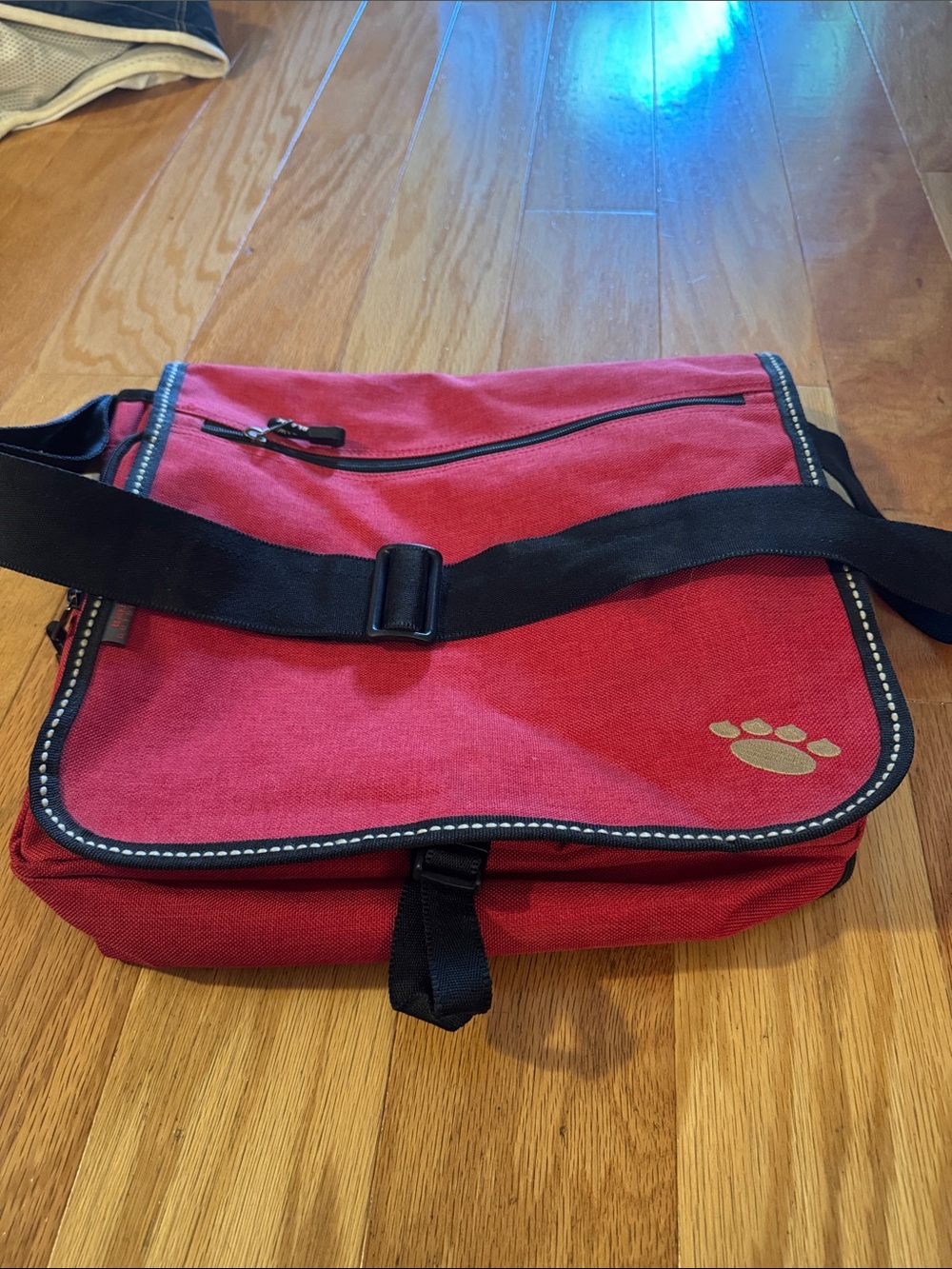 Red Canvas Messenger Bag with Reflective Paw Accent